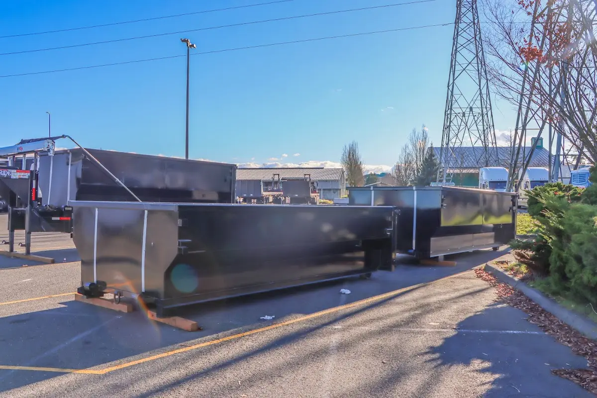 Roll-off dumpster ready for waste disposal at job site for 10 Yard Dumpster Rental in Pittsford